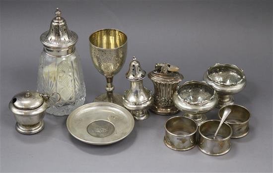 Small silver items including four condiments, dish, goblet, sifter and three napkin rings and a plated Ronson lighter.